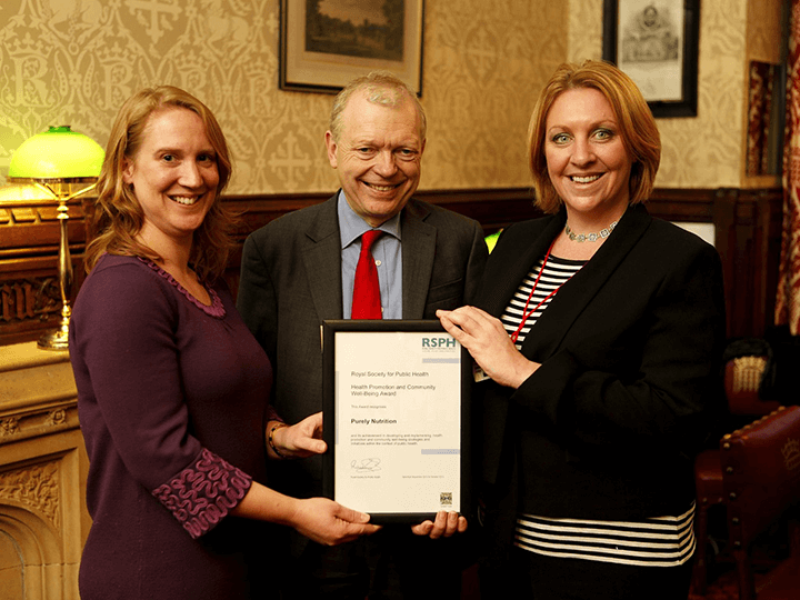 Sorrell Fearnall receiving the Royal Society for Public Health Power in Partnership Award from Lord Haslam at the Houses of Parliament